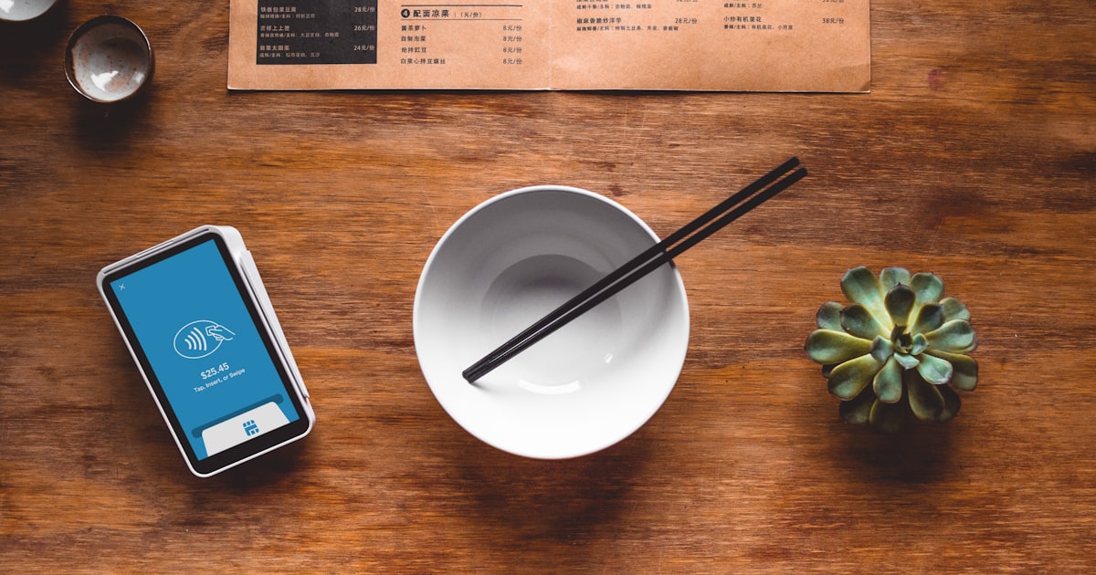 Business handshake between consultant and client at a meeting